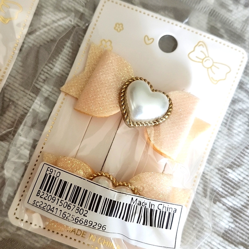 Pearl heart bow